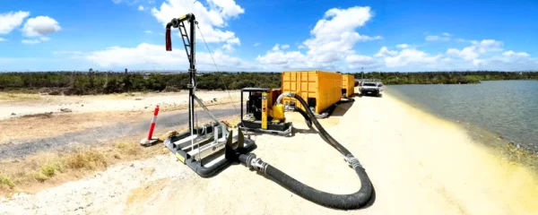 On-site view of a Liquimech bulk liquid storage tank, securely positioned on a J-stand with an attached pump for active liquid management.